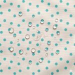Tecido Nylon Impermeável Bolas 1cm Cru e Turquesa
