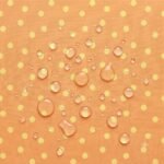 Tecido Nylon Impermeável Bolas 1cm Laranja e Amarelo