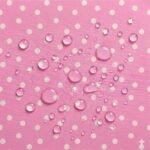 Tecido Nylon Impermeável Bolas 1cm Rosa e Cru