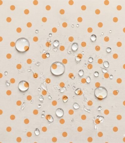 Tecido Nylon Impermeável Bolas 1cm Cru e Laranja