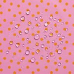 Tecido Nylon Impermeável Bolas 1 cm Rosa Claro e Laranja